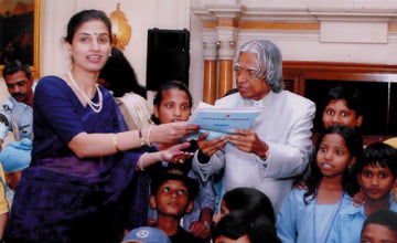 The then President Shri A P J Abdul Kalam being presented with a copy of our magazine by the Director DEEKSHA.